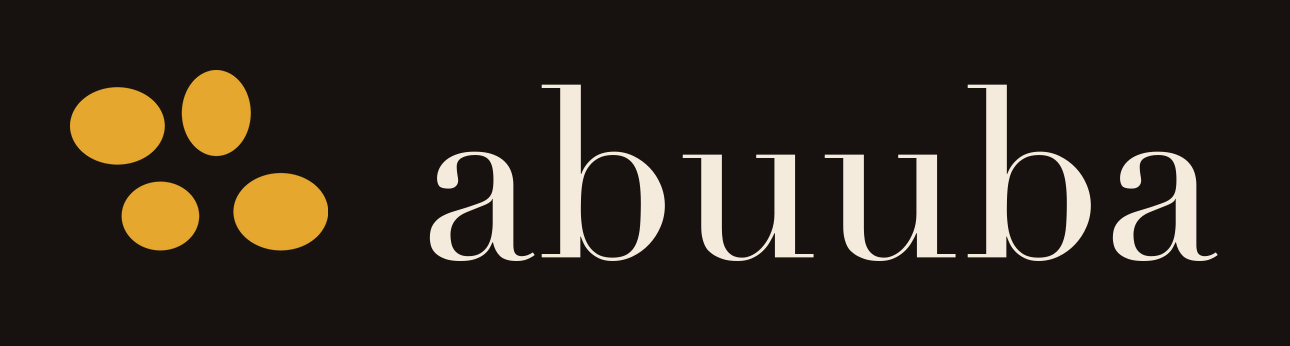 The abuuba logo: four gold spots beside the name in lowercase, on the dark brand background.